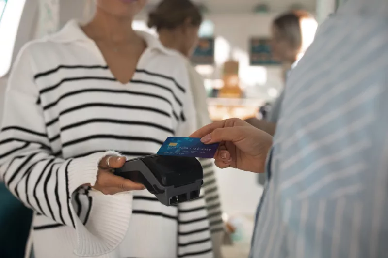 Person paying with nfc technology restaurant